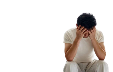 Man experiencing stress related to erectile dysfunction (ED), seeking treatment from Dr. Kalpesh Saswade at Vandana Uro Care in Pune.